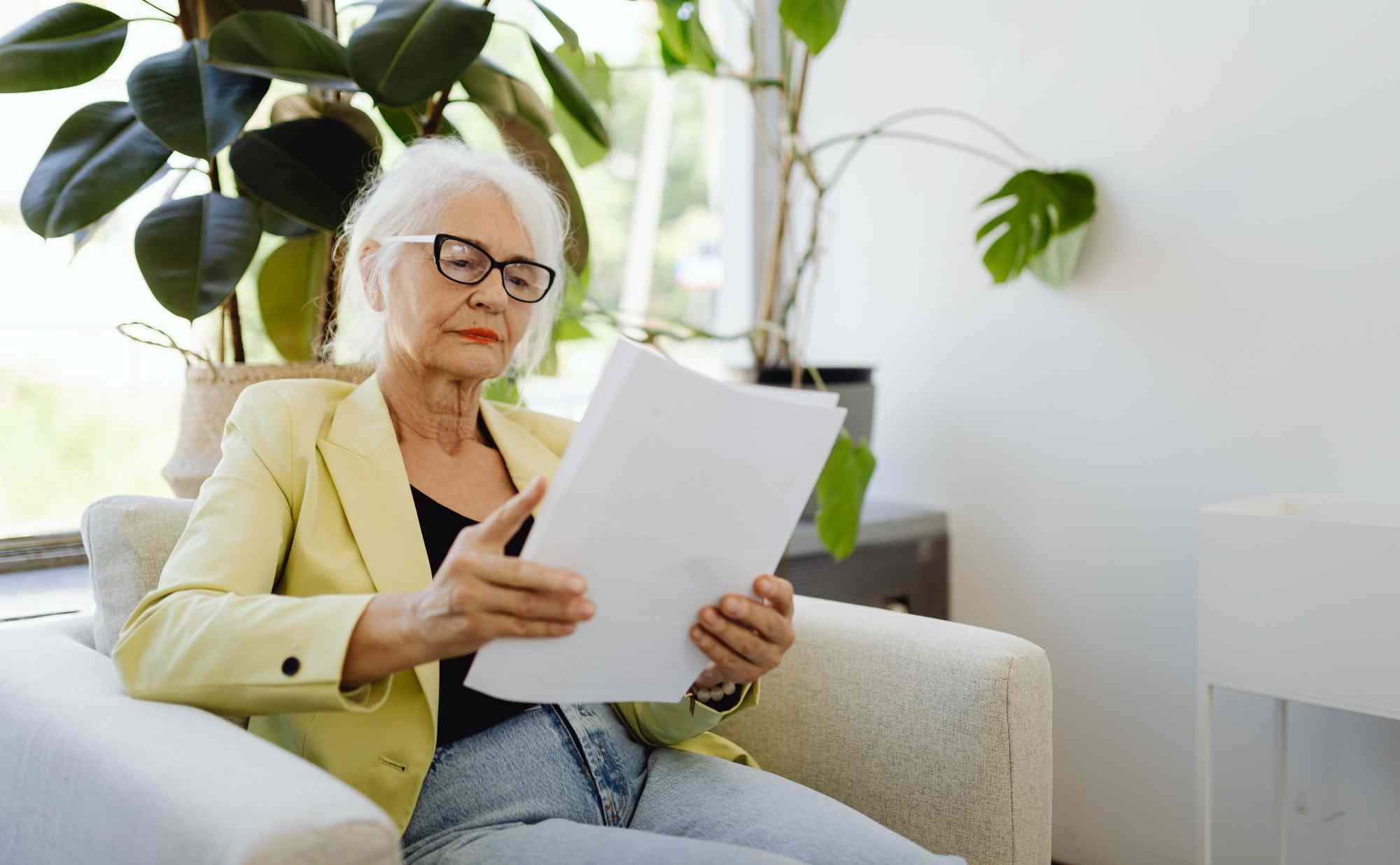 An older woman looking at her Lasting Power of Attorney